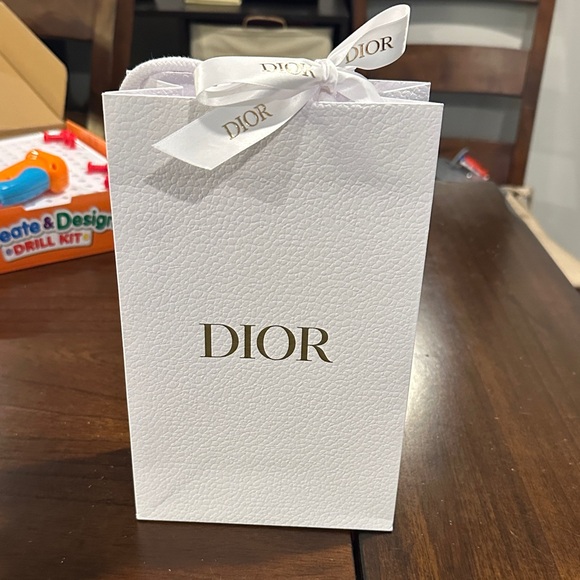 Dior Other - Dior Elegant White Bag with Gold Logo and Ribbon